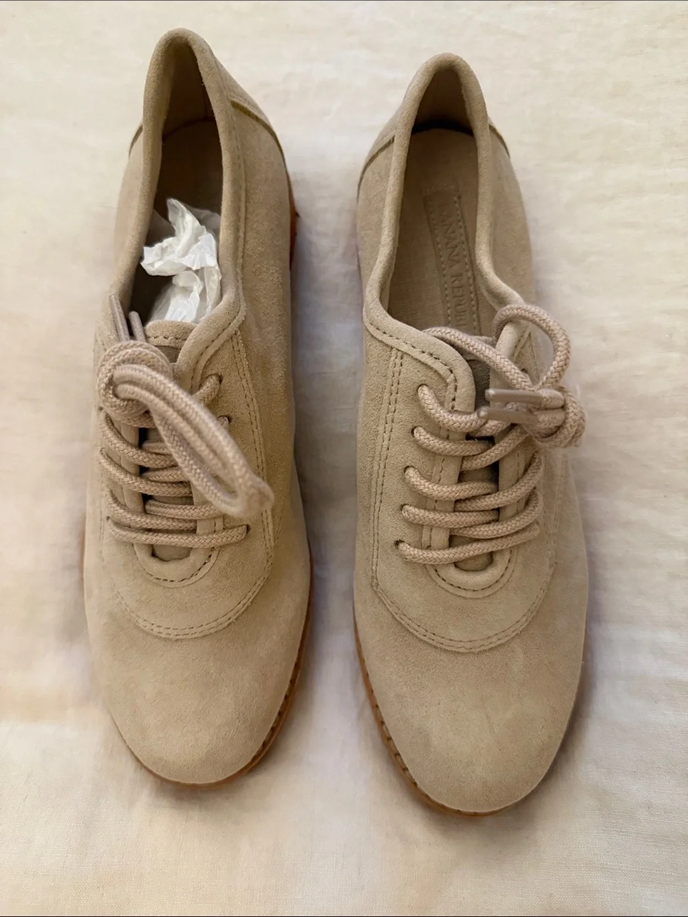 Beige Suede Lace-Up loafers.